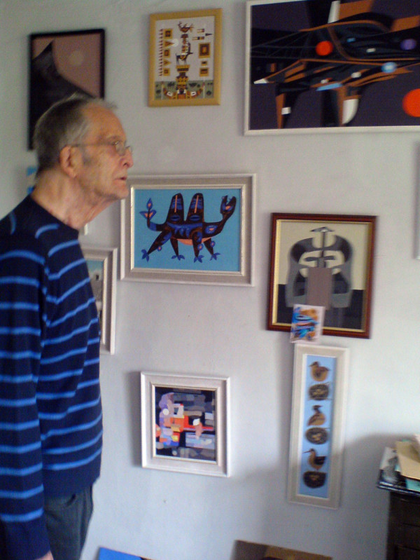 Stewart Irwin in his studio at home with some of the paintings